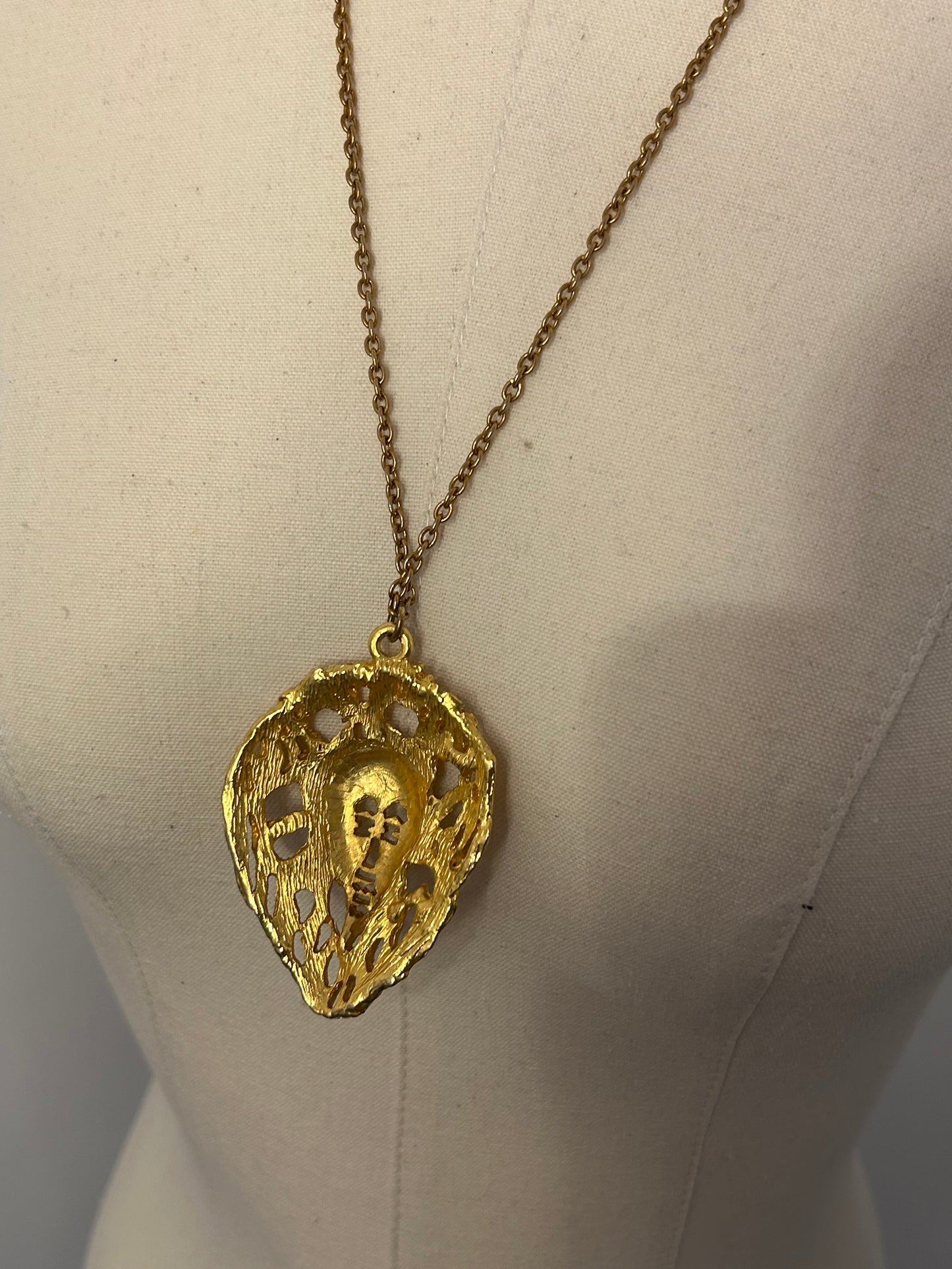 Gold Tone Oval Face Necklace