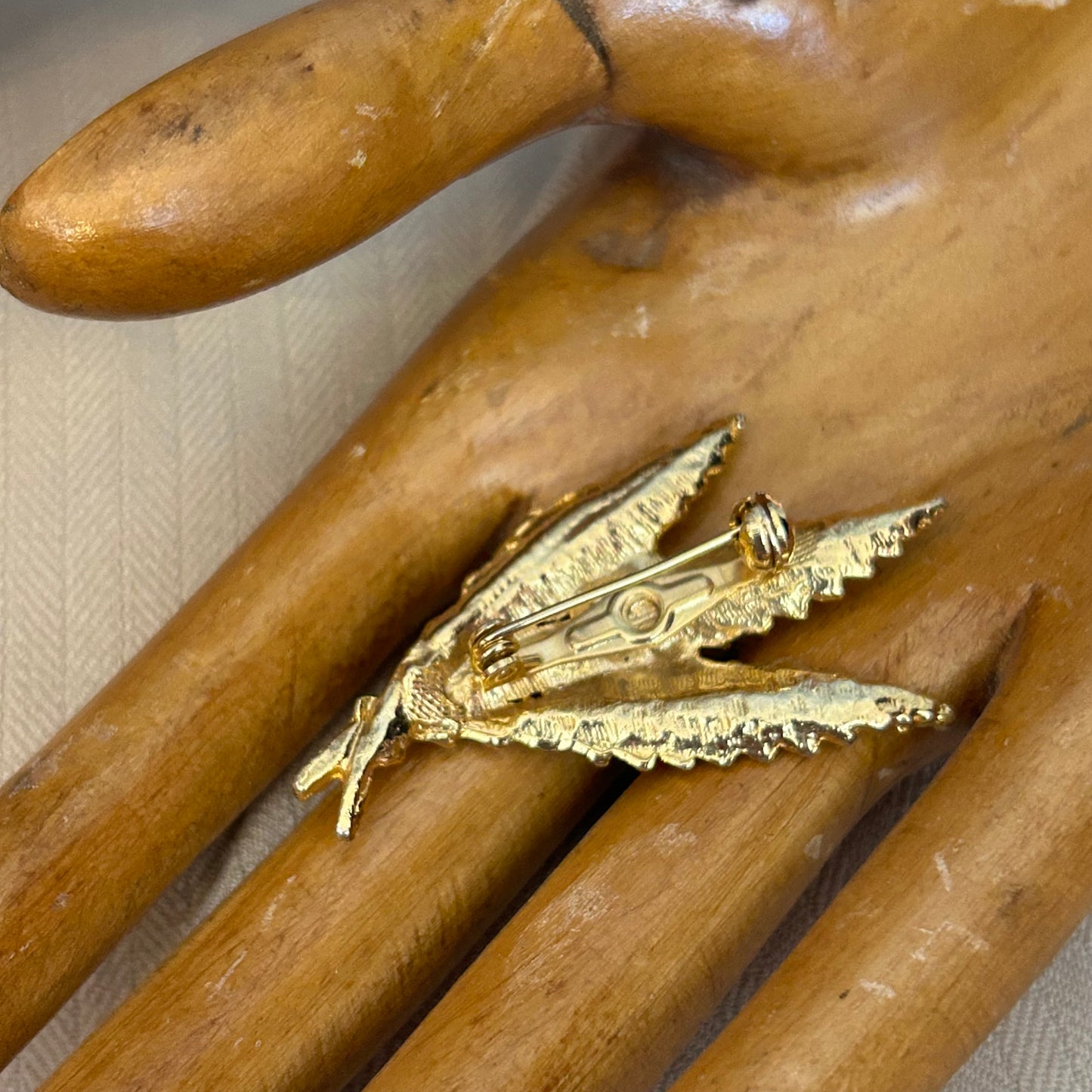 Gold tone Feather Bundle Brooch