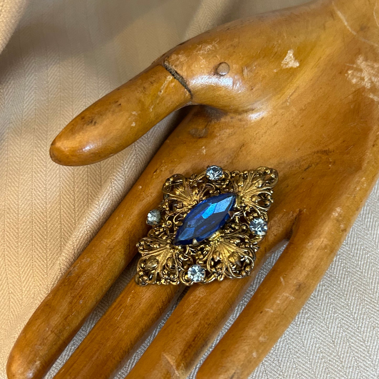 Filigree With Blue Rhinestones Brooch