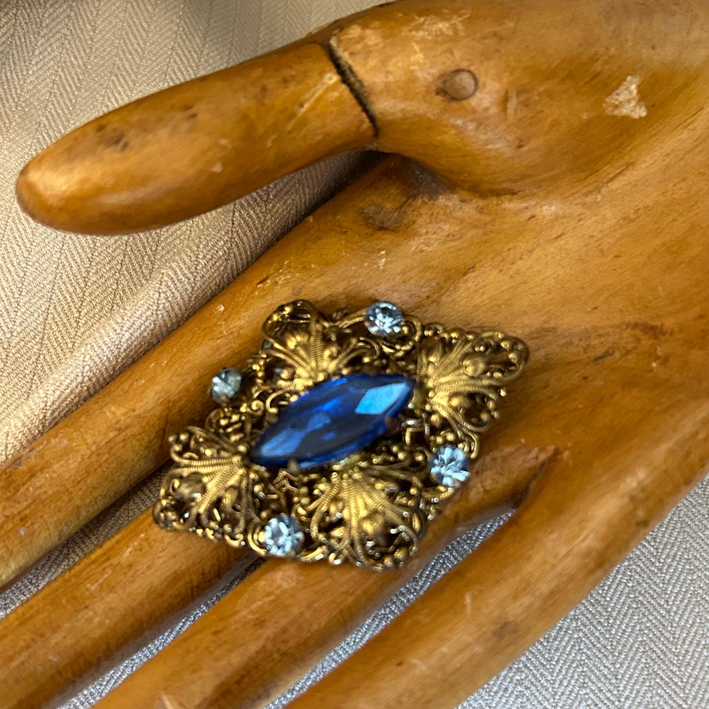 Filigree With Blue Rhinestones Brooch