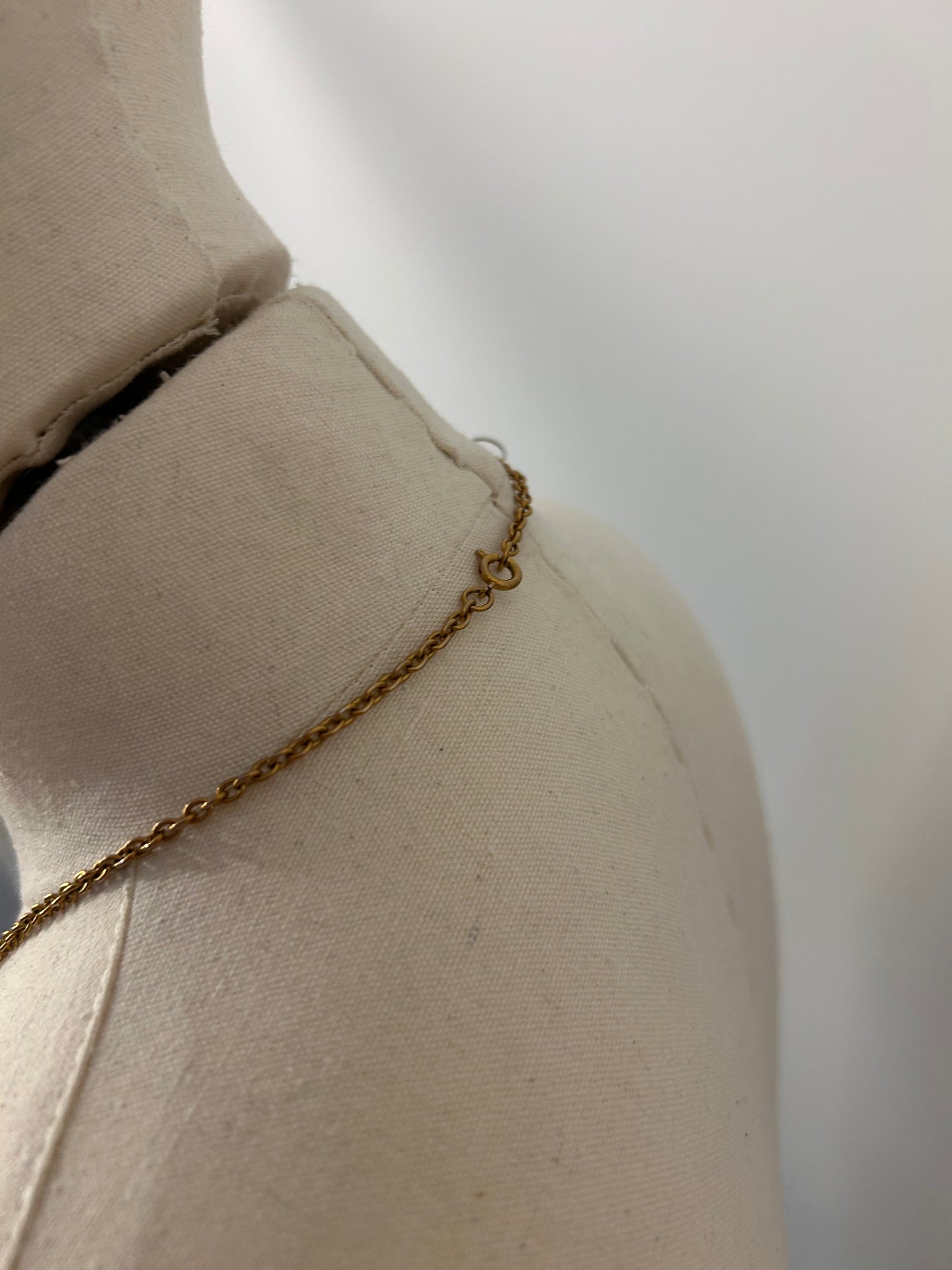 Gold Tone Oval Face Necklace