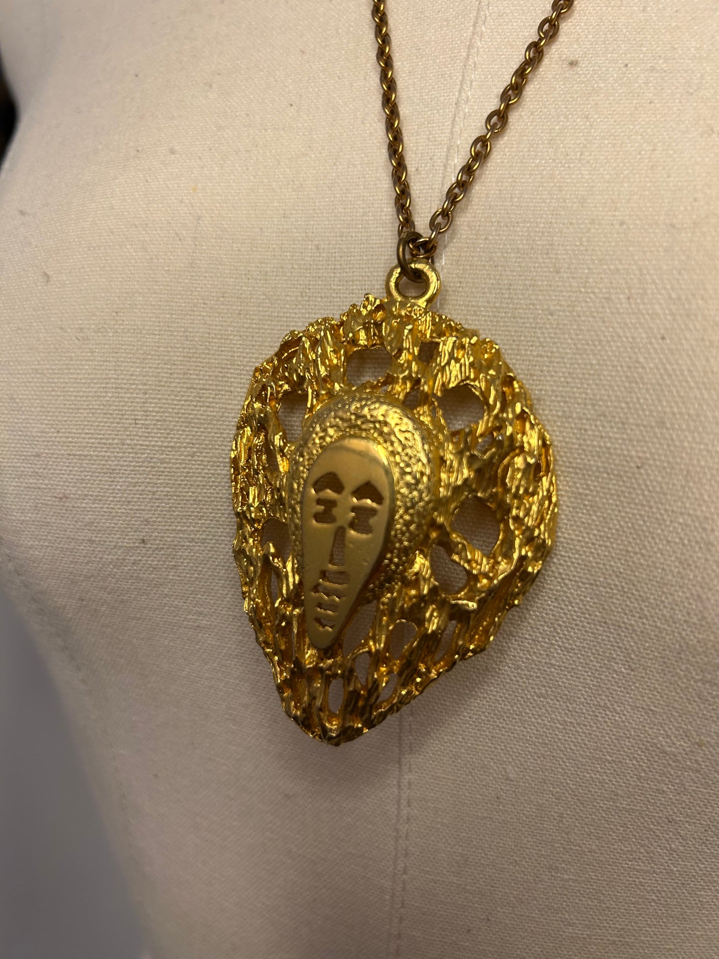 Gold Tone Oval Face Necklace