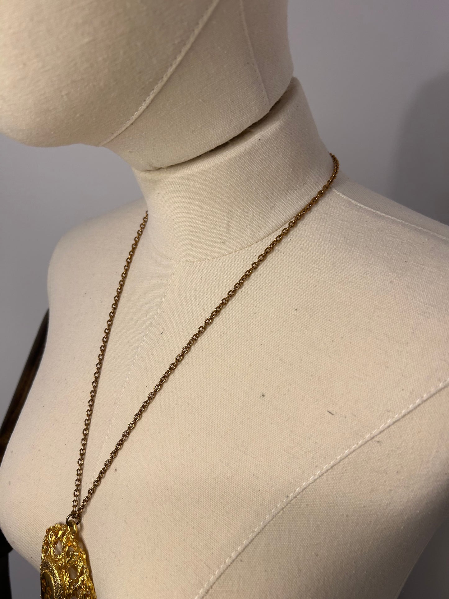 Gold Tone Oval Face Necklace