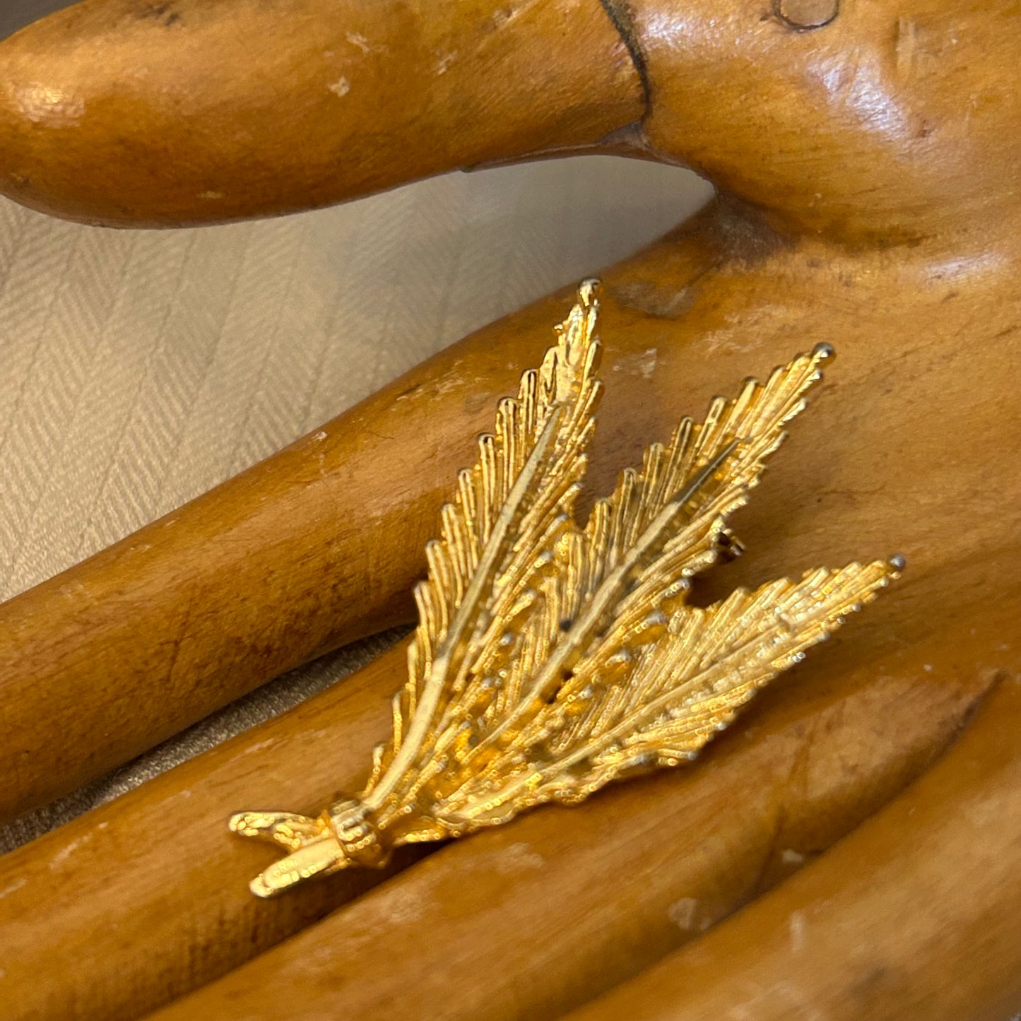 Gold tone Feather Bundle Brooch