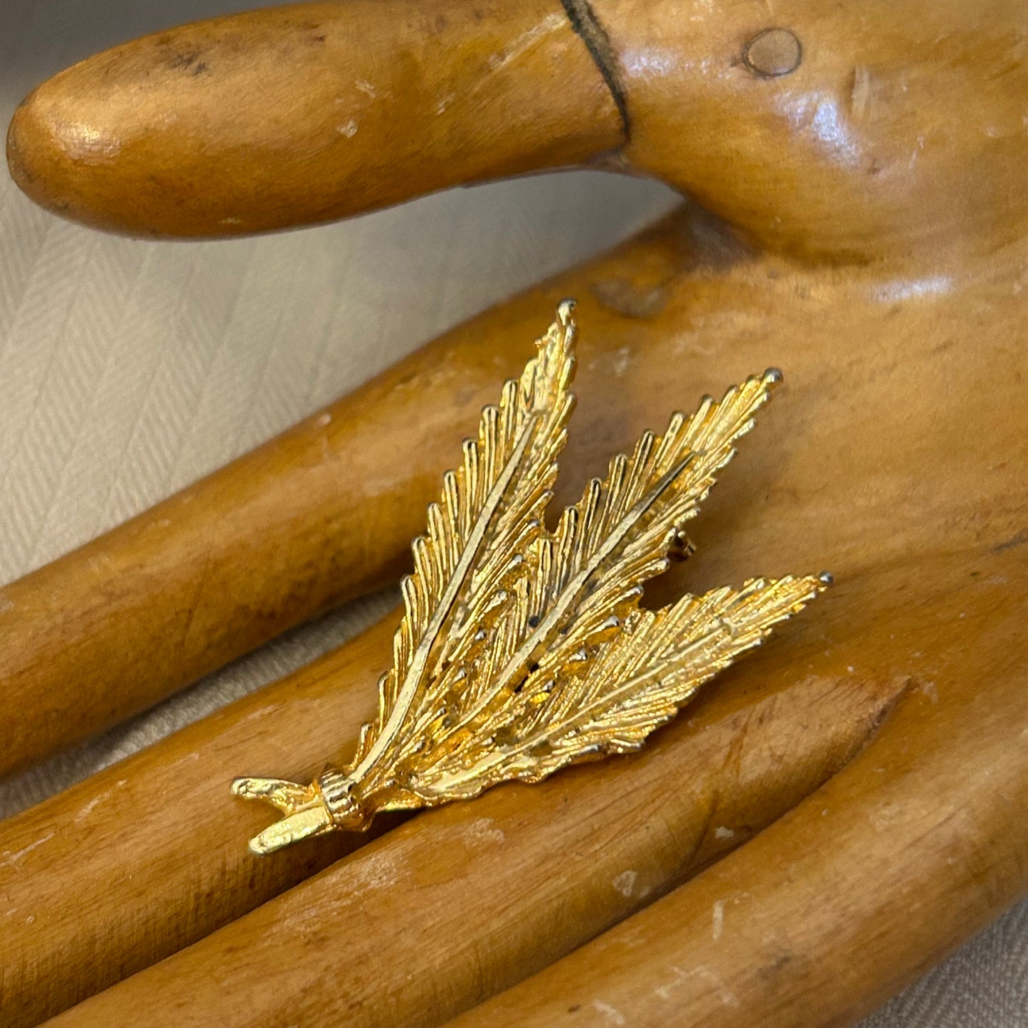 Gold tone Feather Bundle Brooch