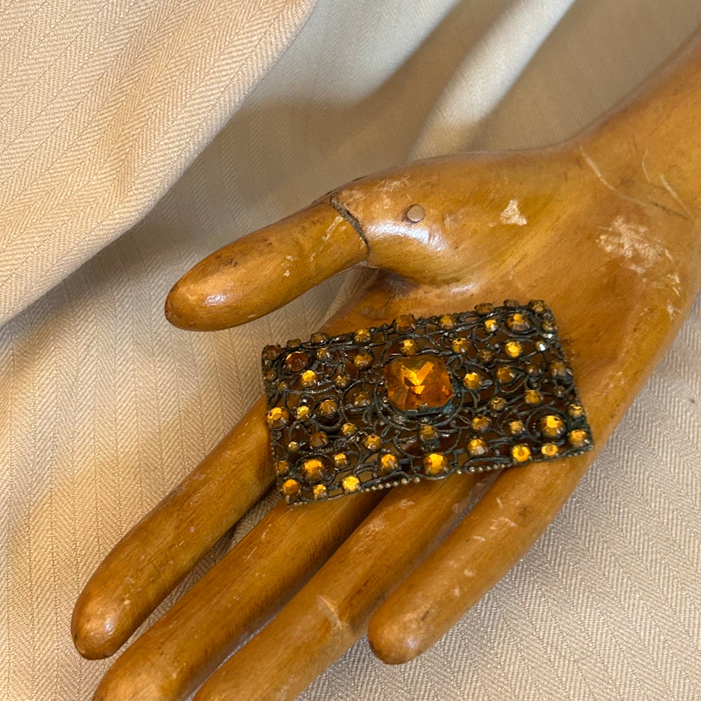 Filigree With Orange Rhinestones Brooch
