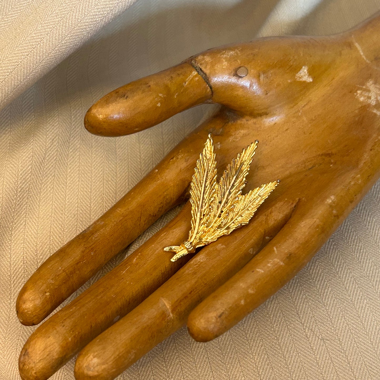 Gold tone Feather Bundle Brooch